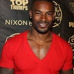 Pic of black man with v cut red t-shirt